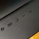 The top of the soundbar features physical controls.